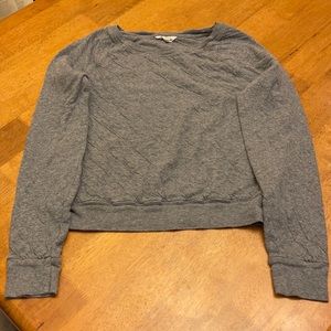 Girls sweatshirt. Material is factory crinkled.